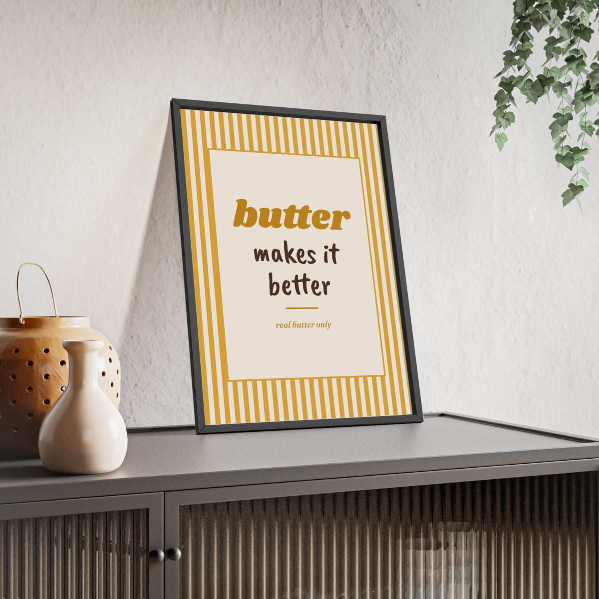 Butter Makes It Better Print framed and leaning on a sideboard