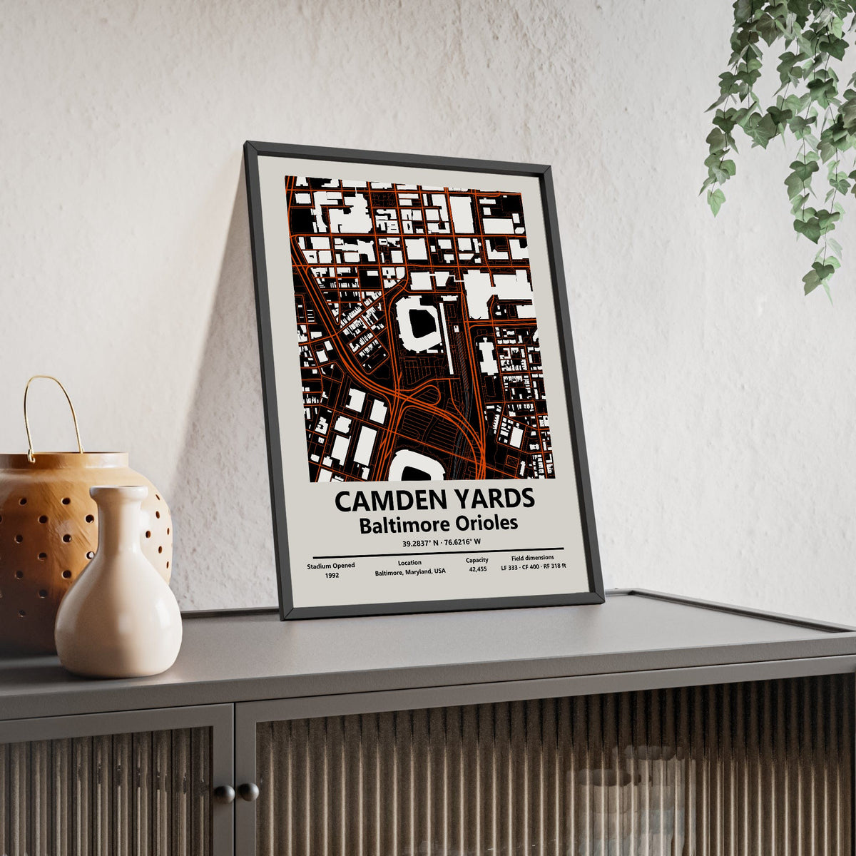 Camden Yards map print framed and leaning on a sideboard