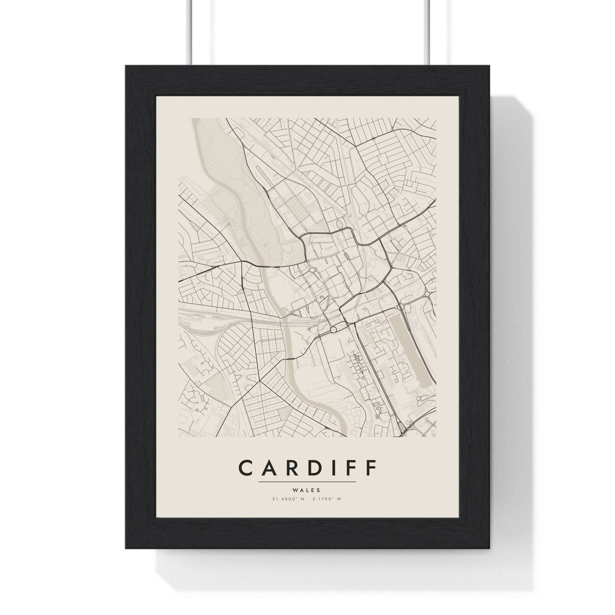 Cardiff street map poster in cream, minimal city map print framed in a black frame