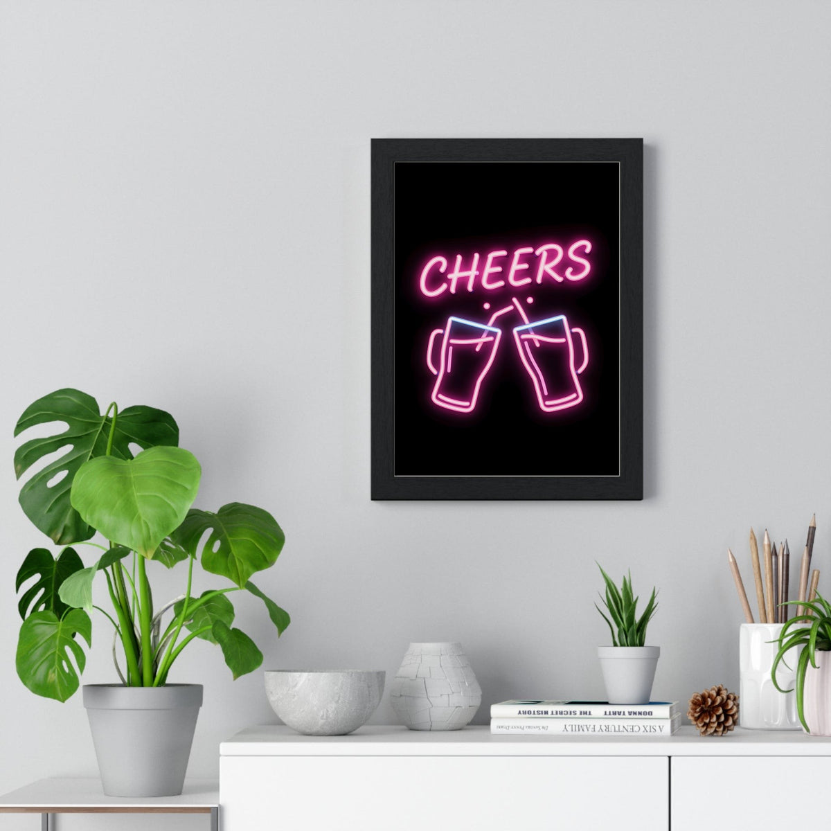 Cheers Neon Print framed on a living room wall