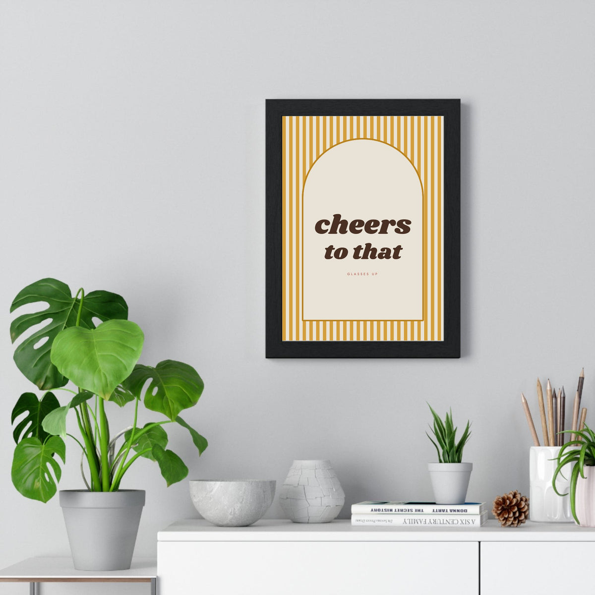 Cheers to That Print framed on a living room wall
