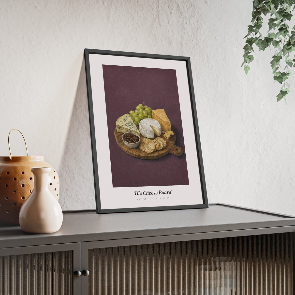 Cheese Board Print framed and leaning on a sideboard