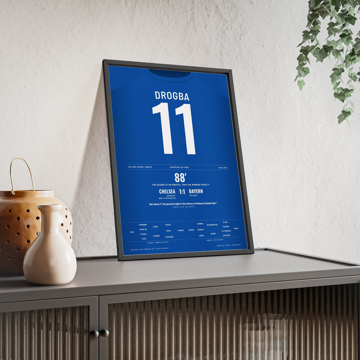 Chelsea Champions League Final 2012 Munich Poster - Drogba 11 framed and leaning on a sideboard