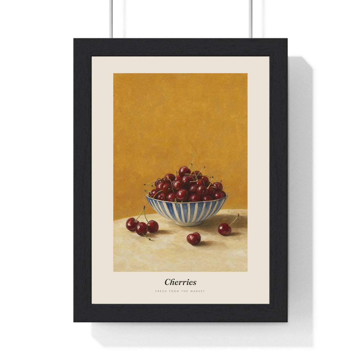 Cherries Print framed in a black frame, ready to hang