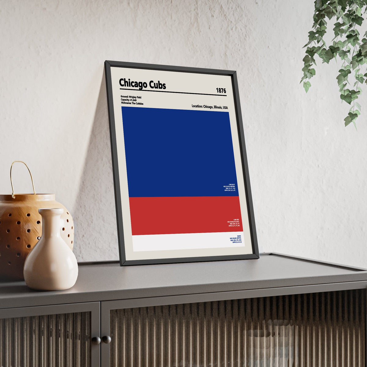 Chicago Cubs colour swatch print framed and leaning on a sideboard