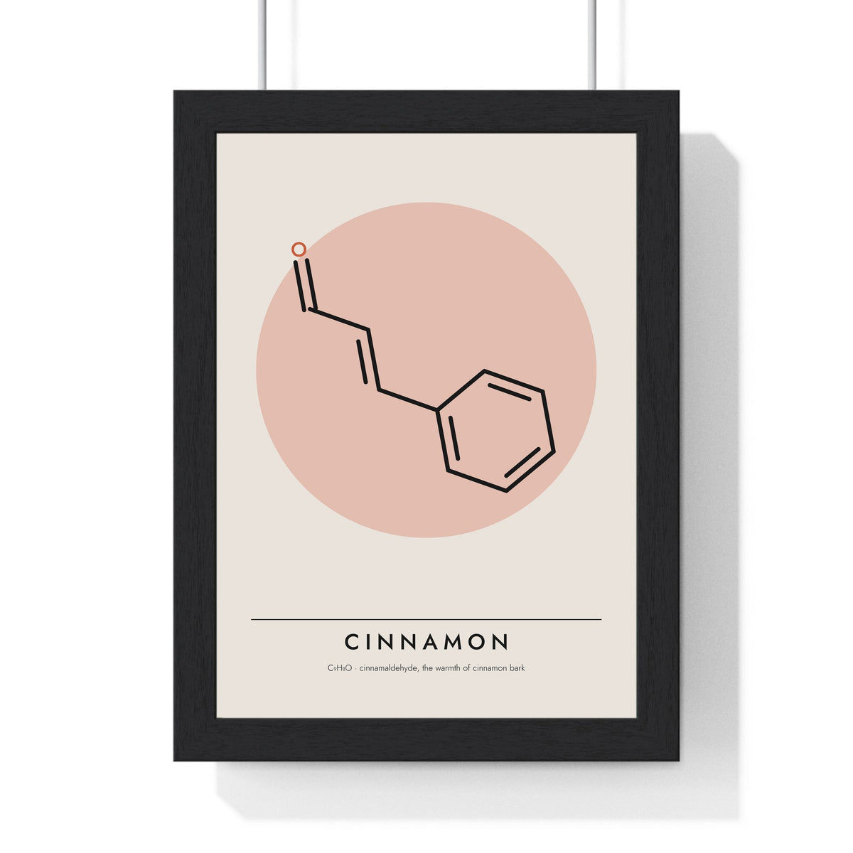 Cinnamaldehyde Molecule print framed in a black frame, ready to hang