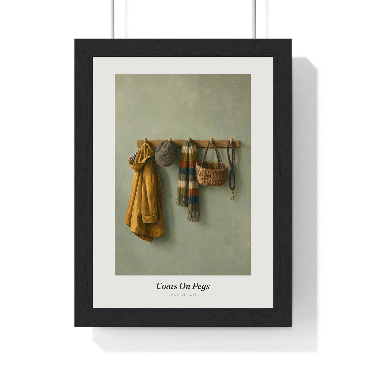 Coats on Pegs Print framed in a black frame, ready to hang
