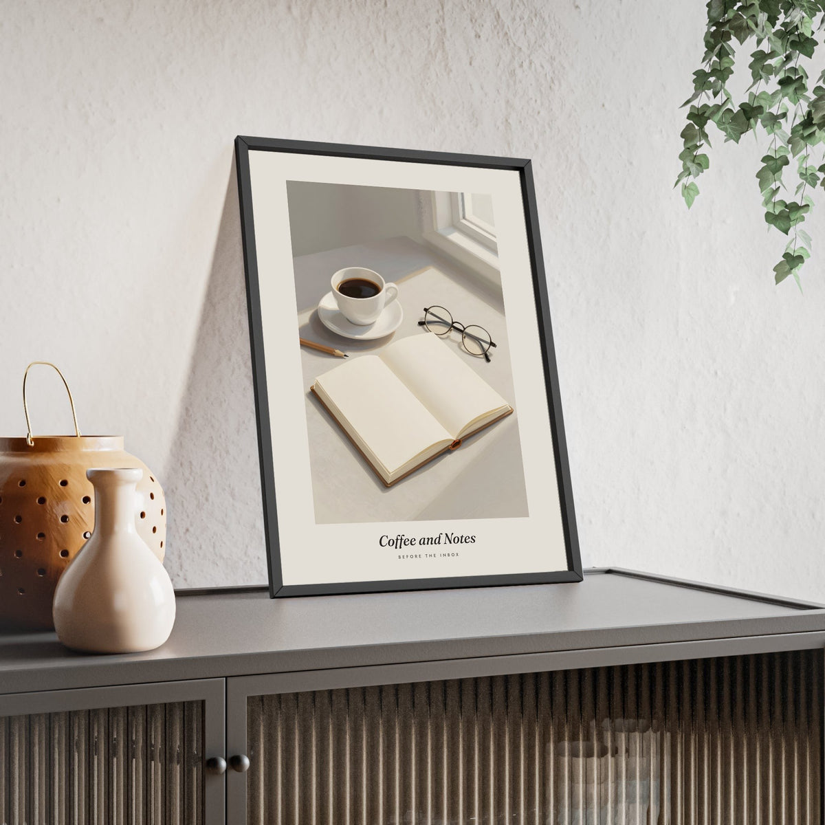 Coffee and Notebook Print - Home Office Wall Art framed and leaning on a sideboard