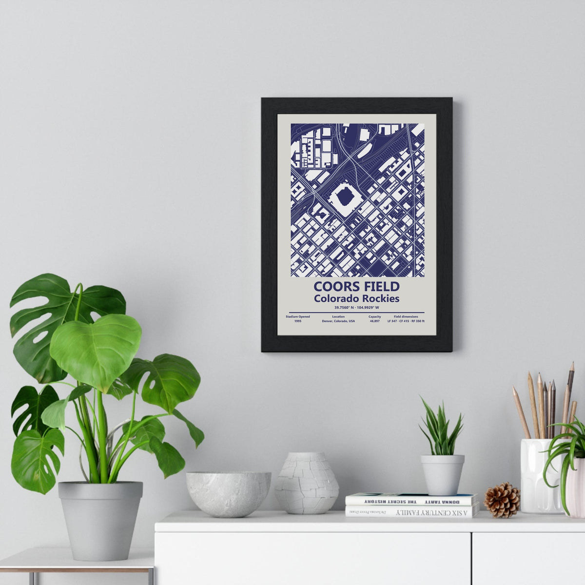 Coors Field map print framed on a living room wall