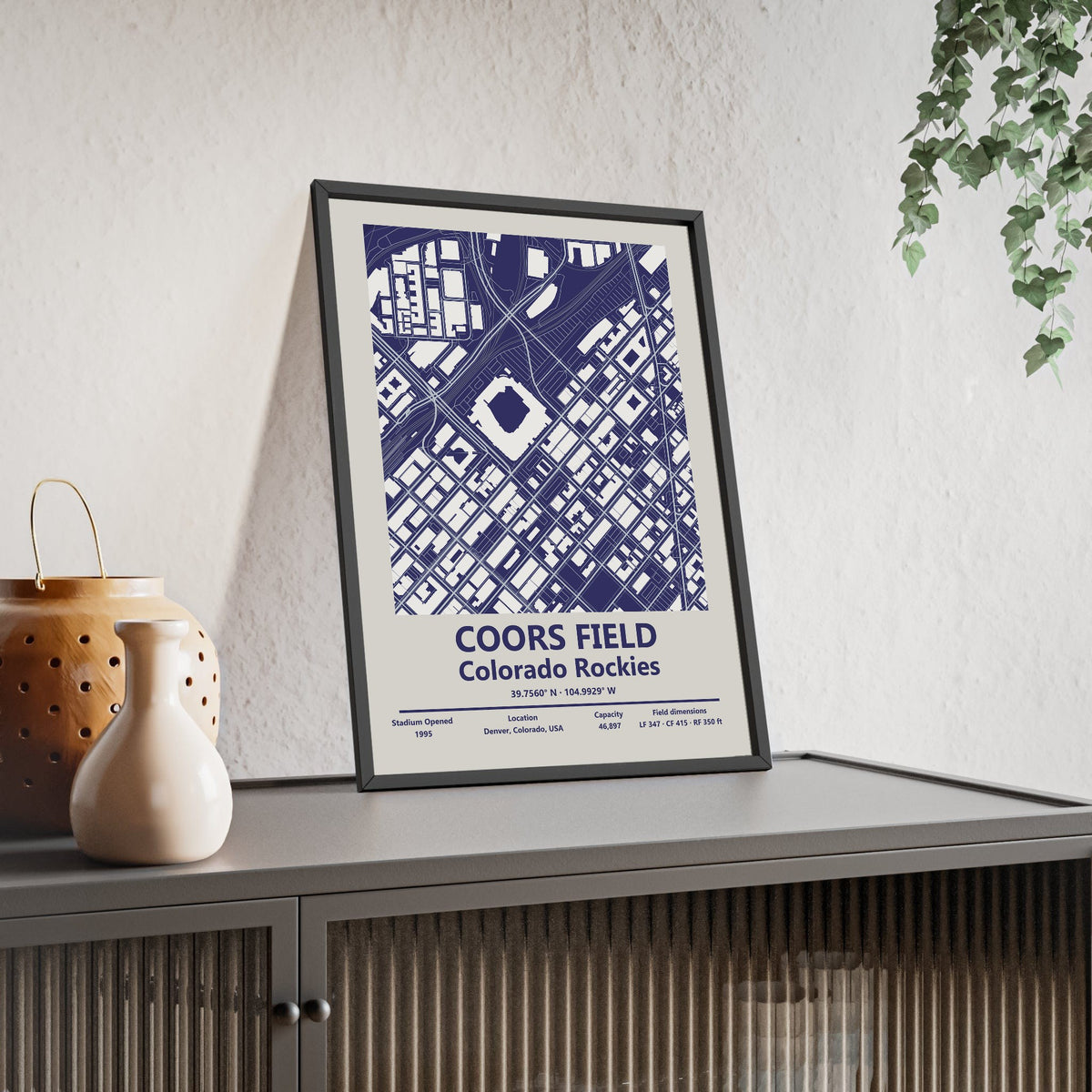 Coors Field map print framed and leaning on a sideboard