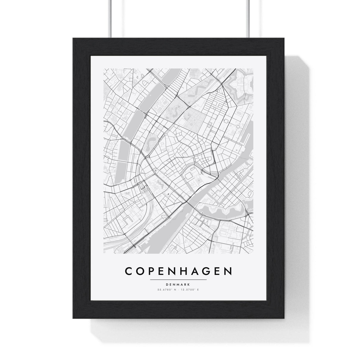 Copenhagen street map poster in white, minimal city map print framed in a black frame