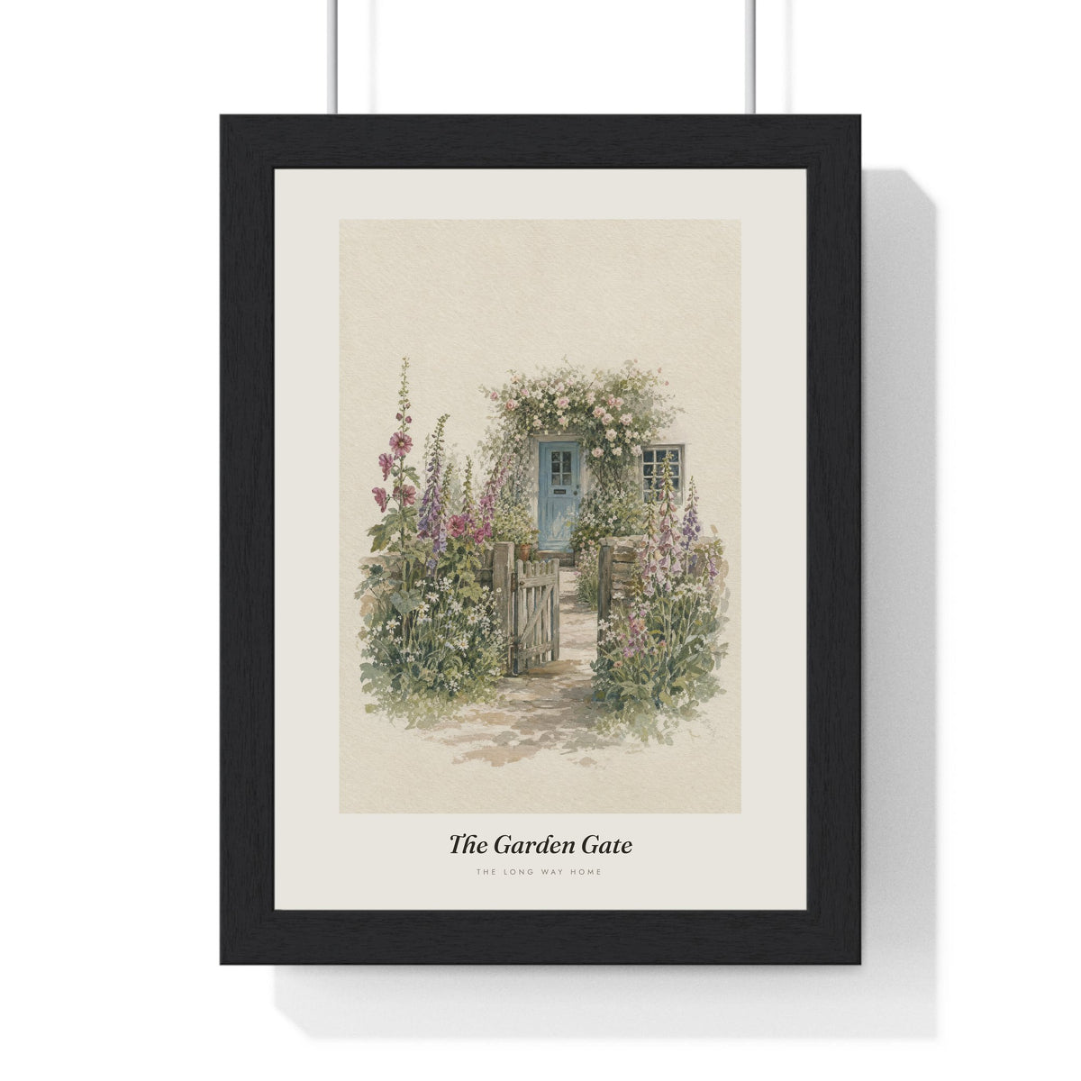 Cottage Garden Gate Print framed in a black frame, ready to hang