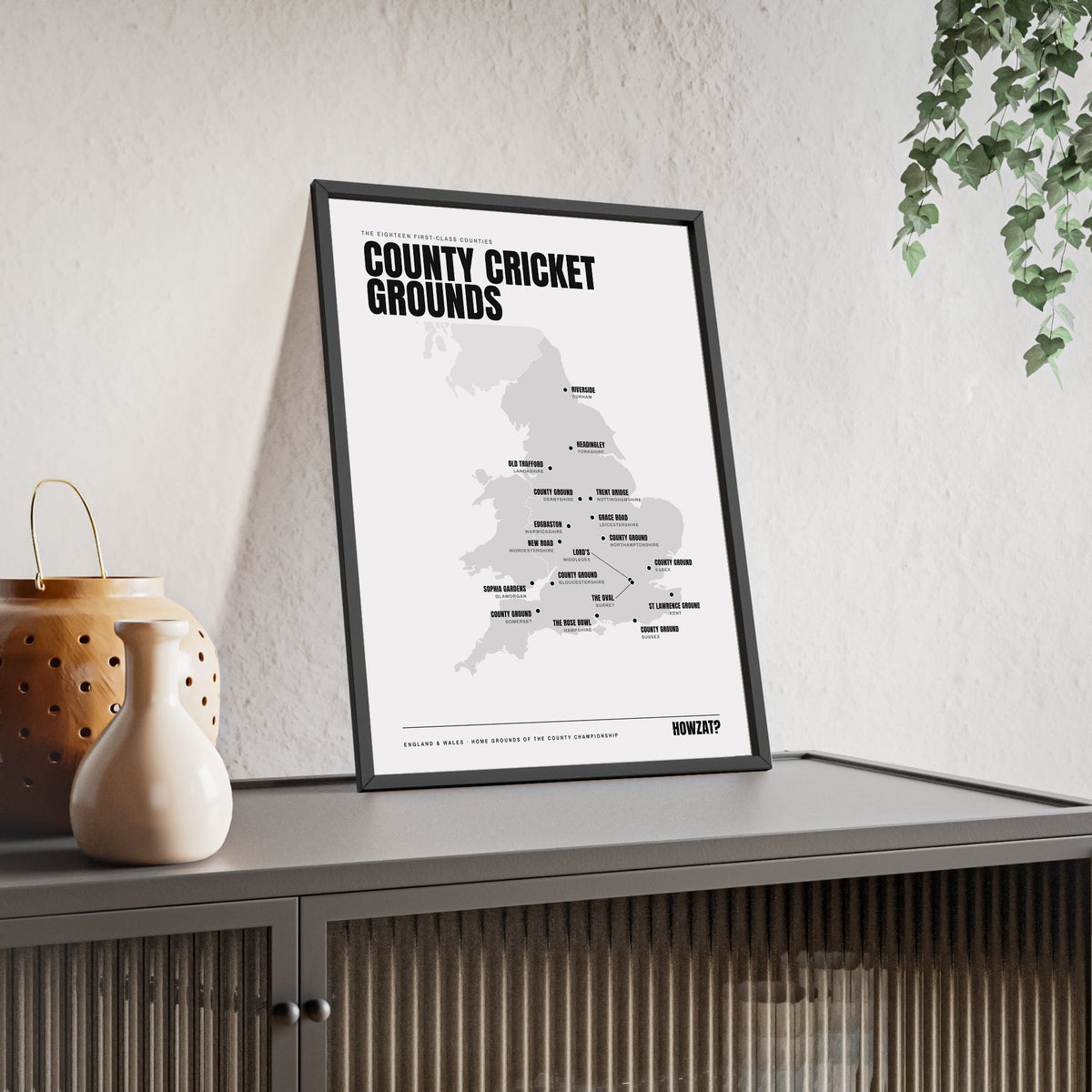 County Cricket Grounds Map print framed and leaning on a sideboard