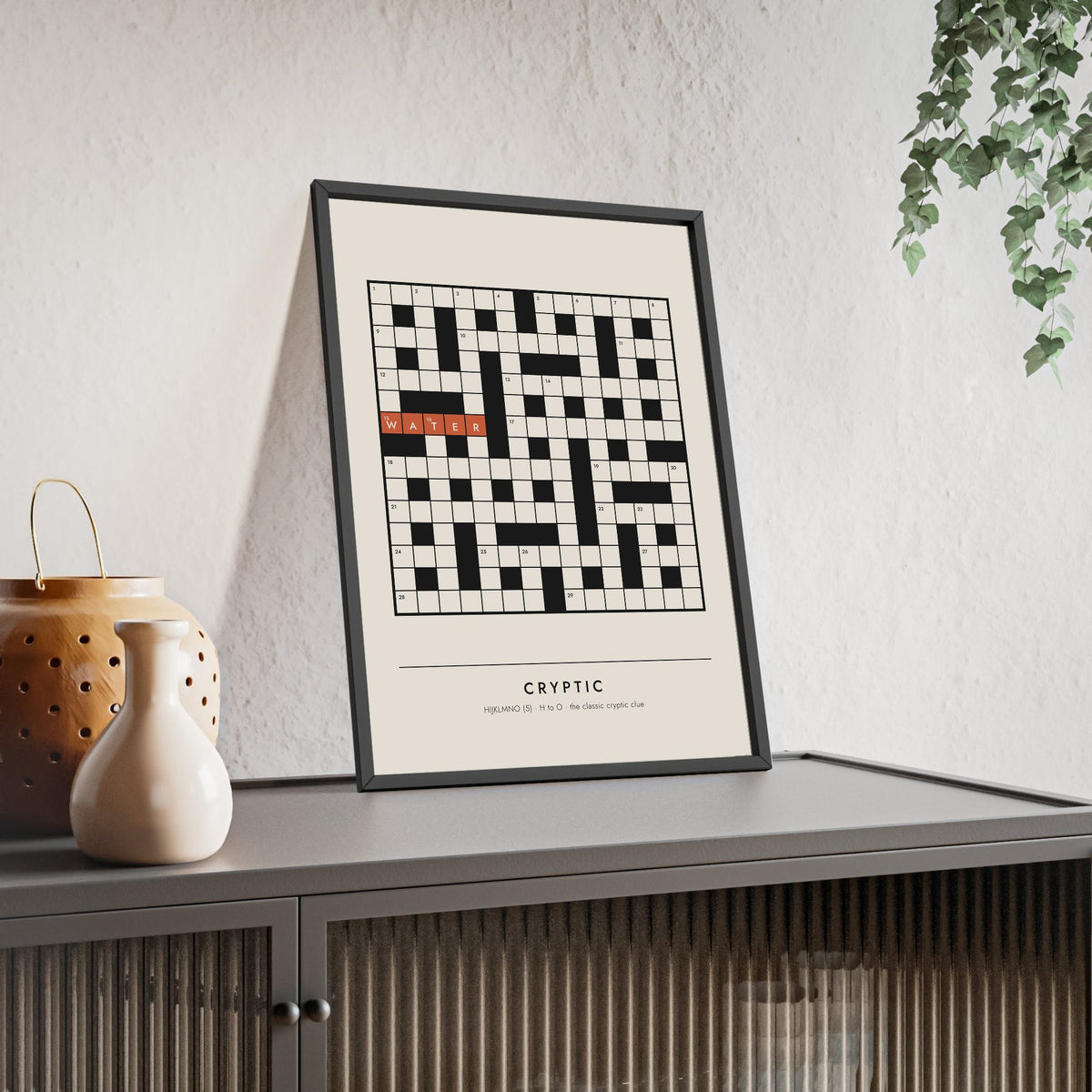 Cryptic Crossword print framed and leaning on a sideboard