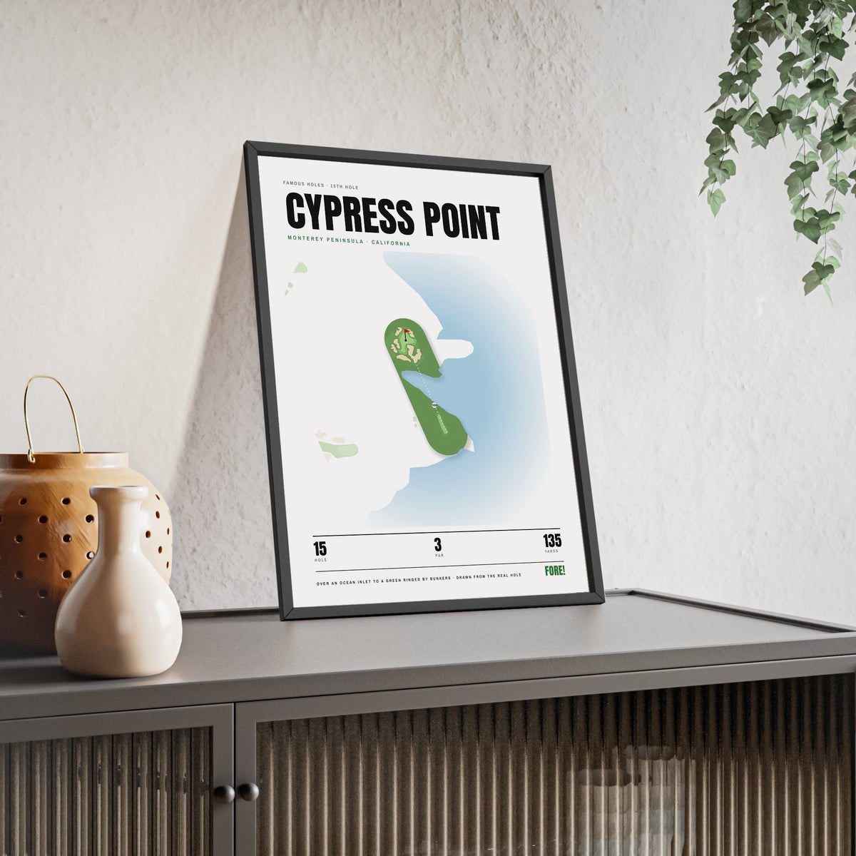 Cypress Point 15th Hole White print framed and leaning on a sideboard
