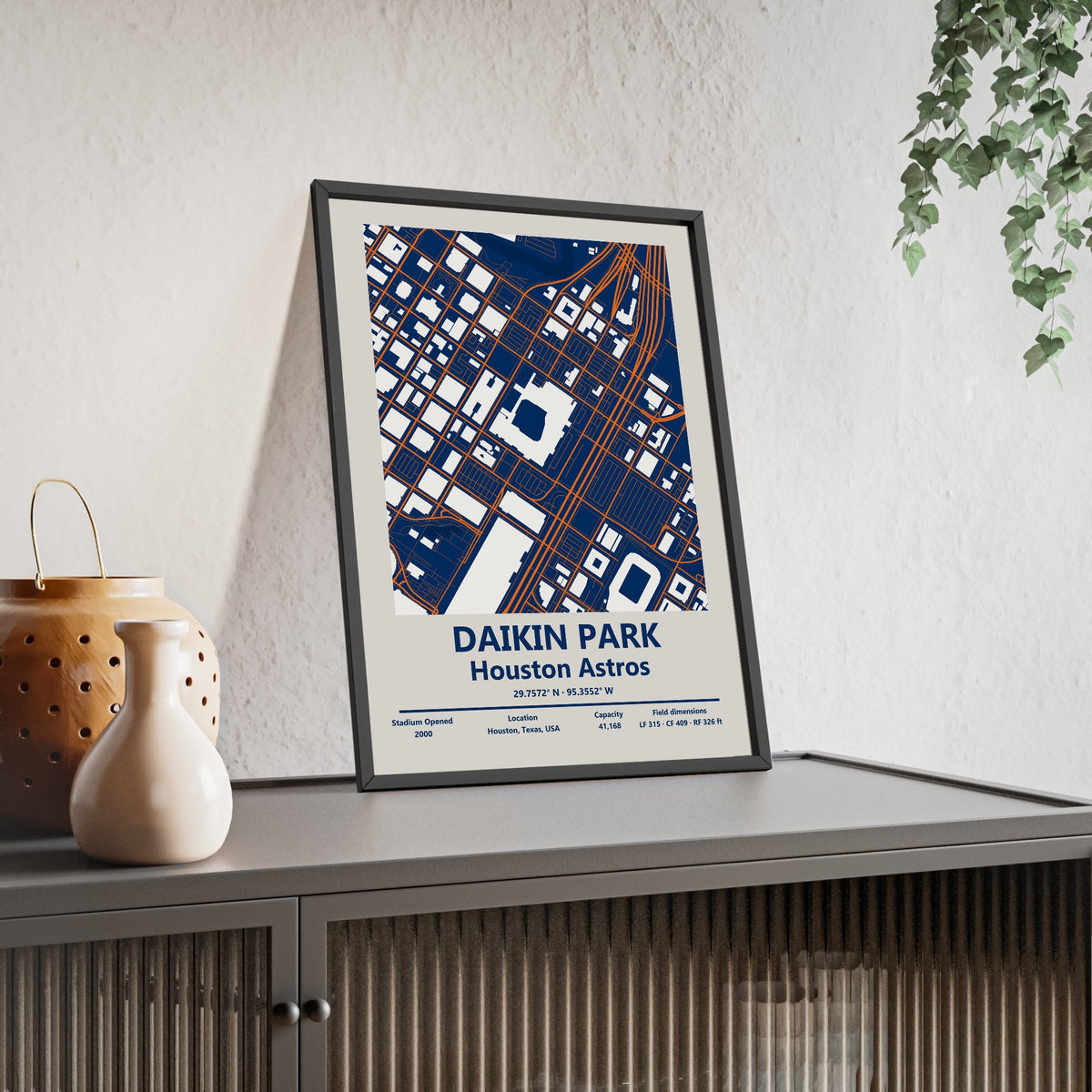 Daikin Park map print framed and leaning on a sideboard