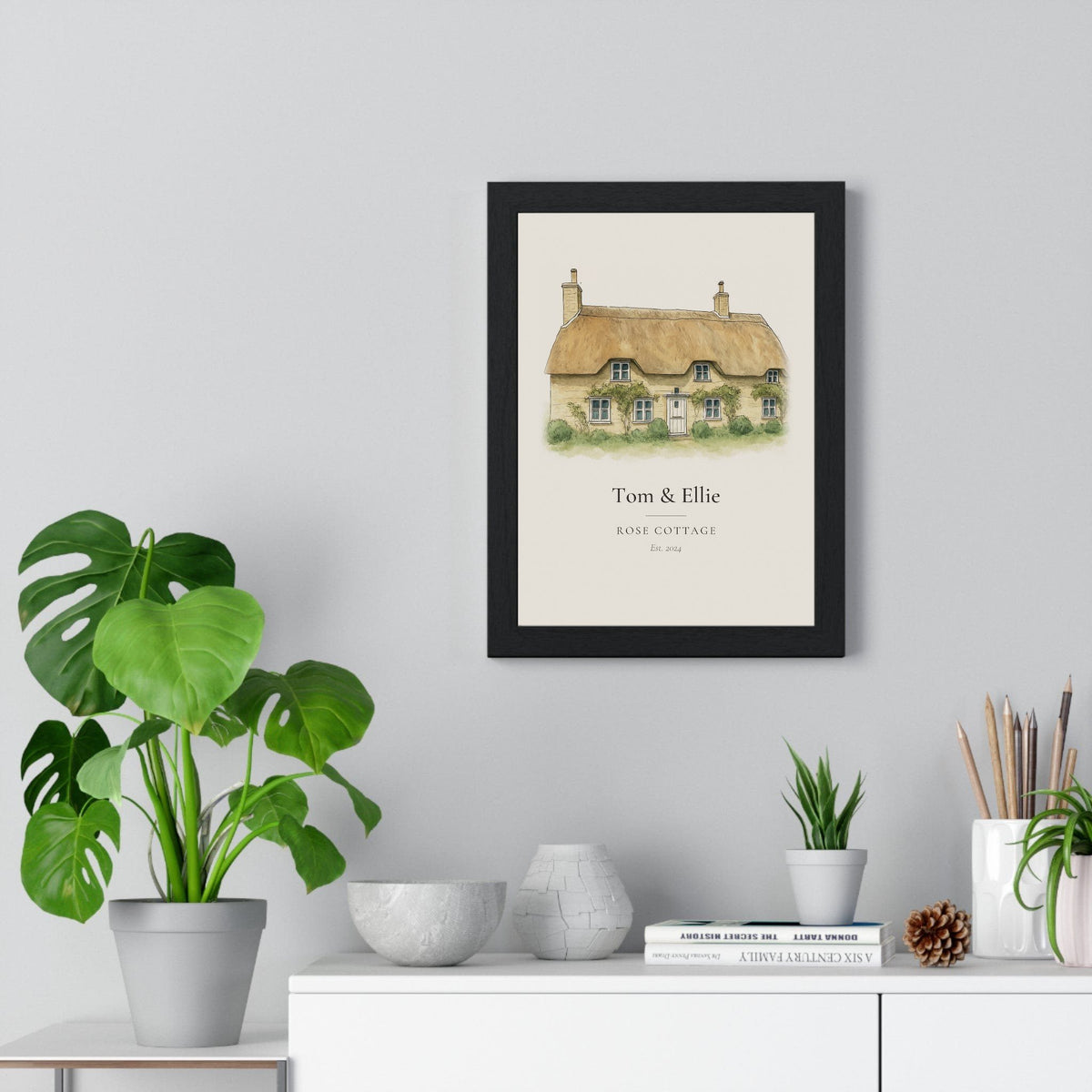 Thatched cottage house portrait from photo, personalised Rose Cottage watercolour print on a living room wall