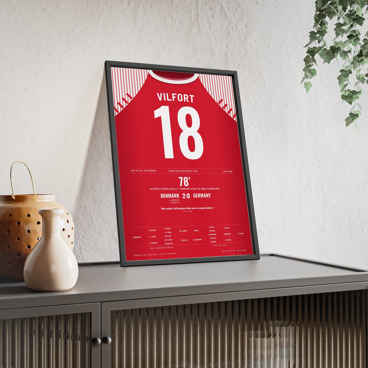 Denmark Euro 92 Final Poster - Kim Vilfort 18 v Germany Gothenburg Shirt Print framed and leaning on a sideboard