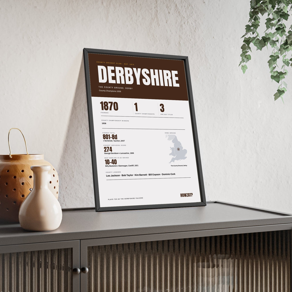 Derbyshire Cricket print framed and leaning on a sideboard
