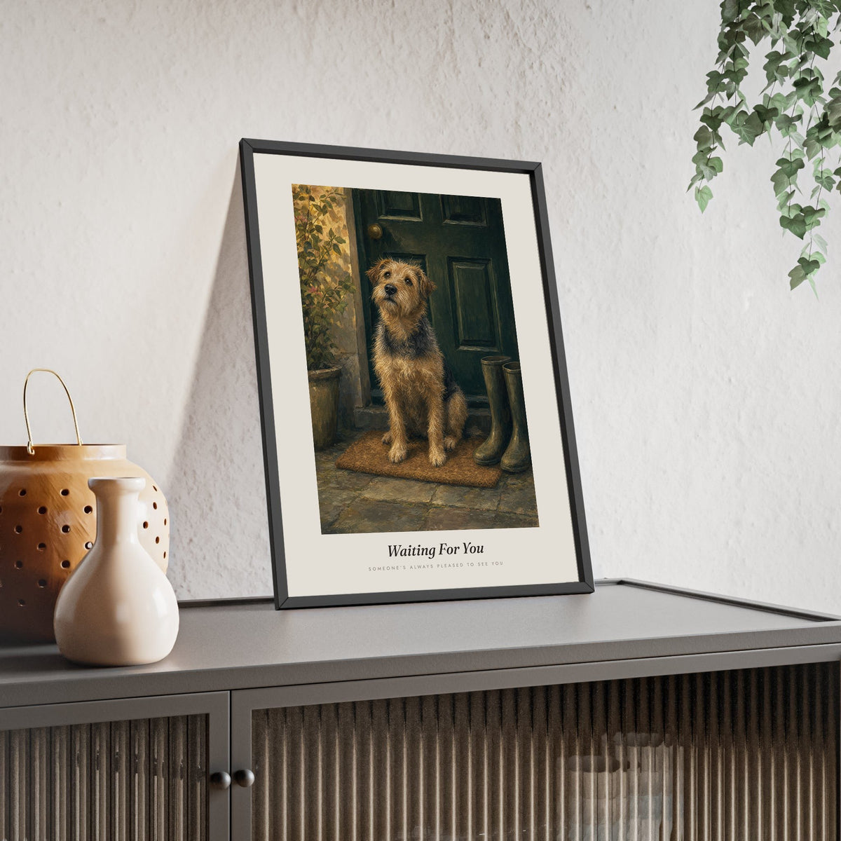 Dog Waiting at the Door Print framed and leaning on a sideboard