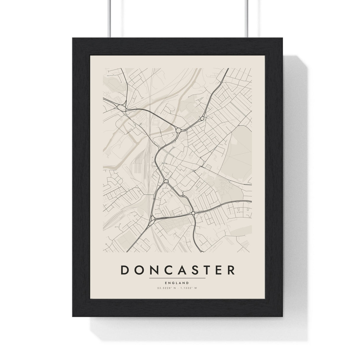 Doncaster street map poster in cream, minimal city map print framed in a black frame