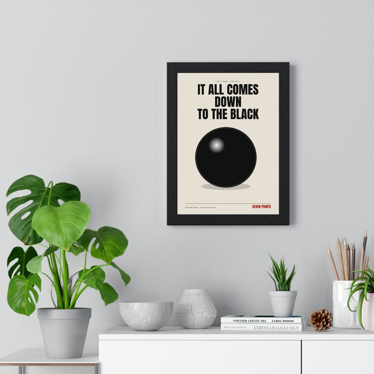 Down To The Black Snooker print framed on a living room wall