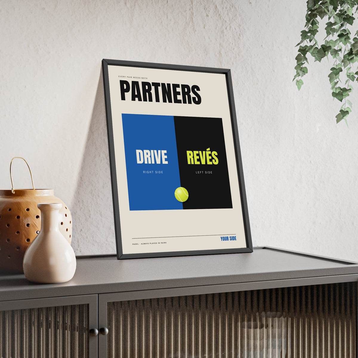 Drive and Revés Padel print framed and leaning on a sideboard