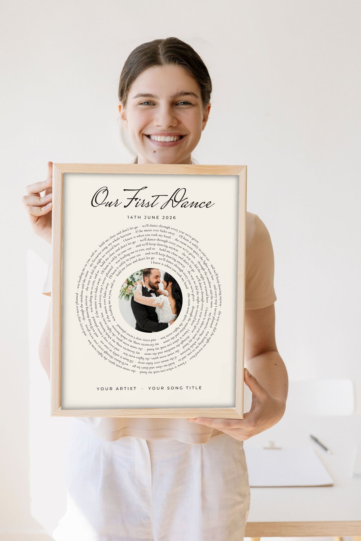 Personalised First Dance Spiral Lyrics Print - Lifestyle - held by a smiling woman