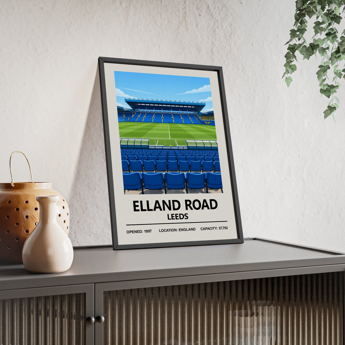 Leeds United Elland Road print framed and leaning on a sideboard