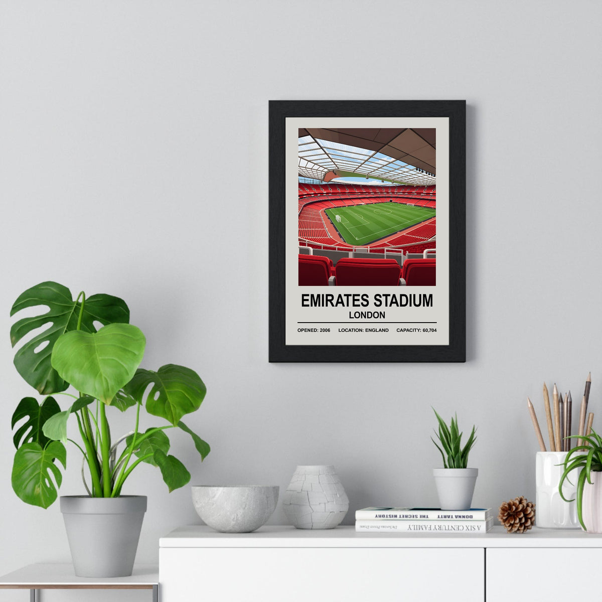 Arsenal Emirates Stadium print framed on a living room wall
