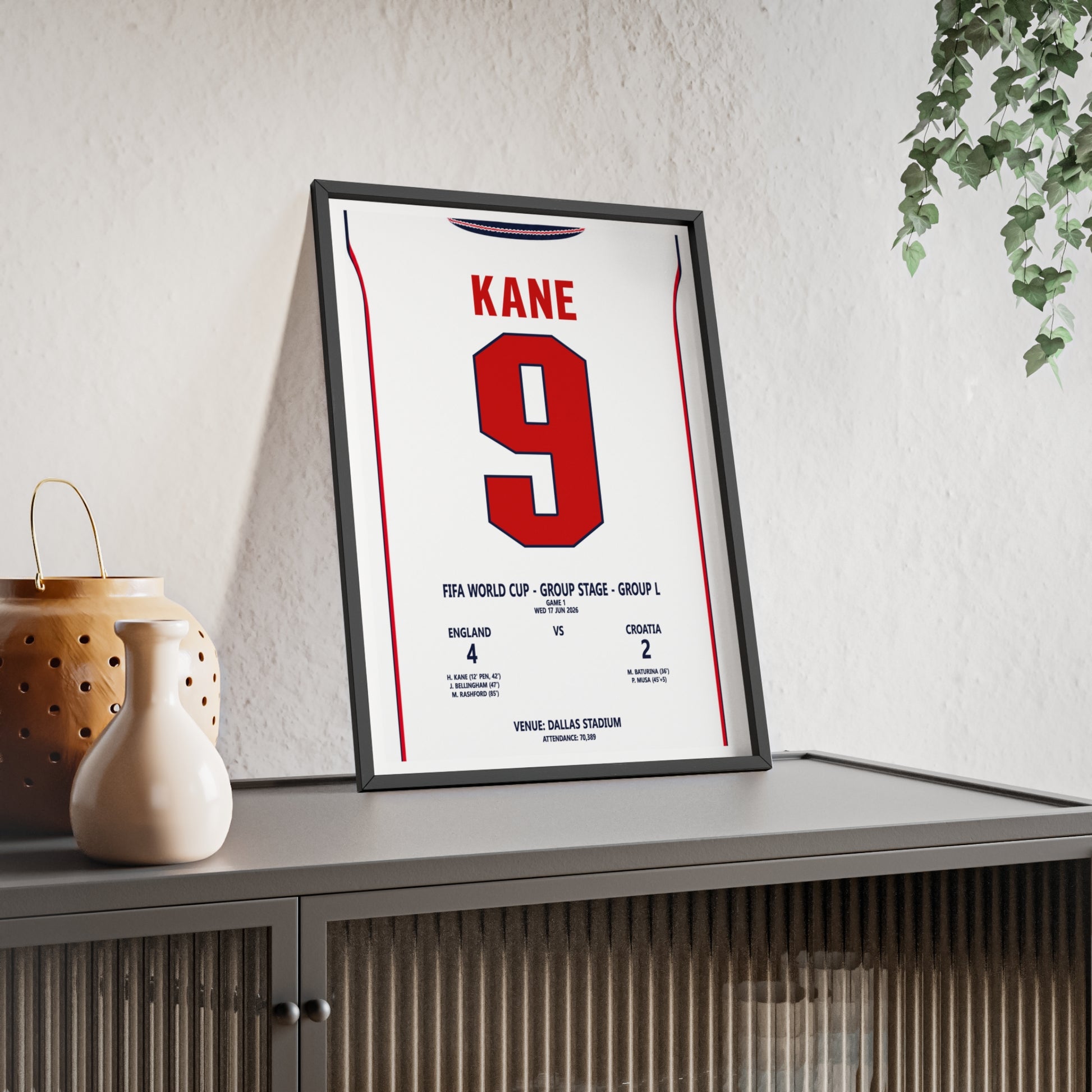 England Kane 9 World Cup 2026 football poster in black frame on sideboard
