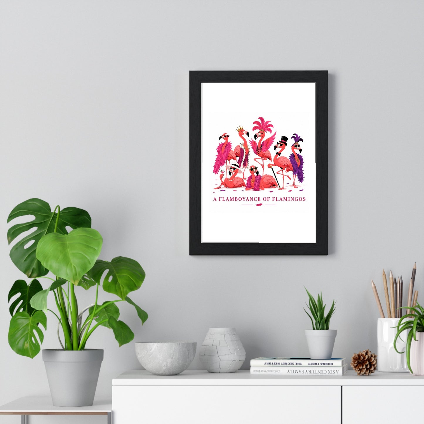 A Flamboyance of Flamingos framed poster on a living room wall