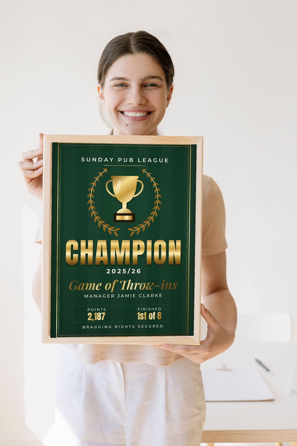 Personalised Fantasy Football Champion Print - Lifestyle - held by a smiling woman