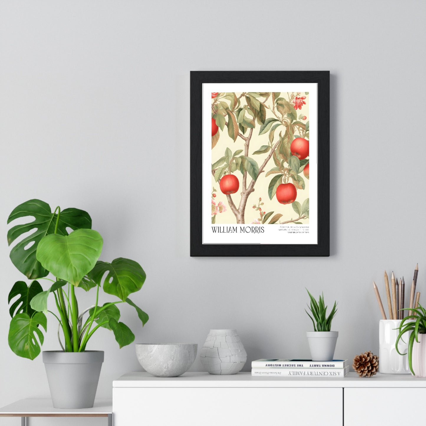 11x14-17 framed poster displayed on living room wall above furniture