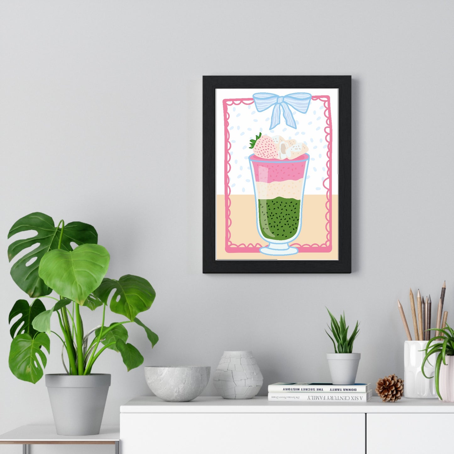 Matcha latte poster framed on living room wall above side table
