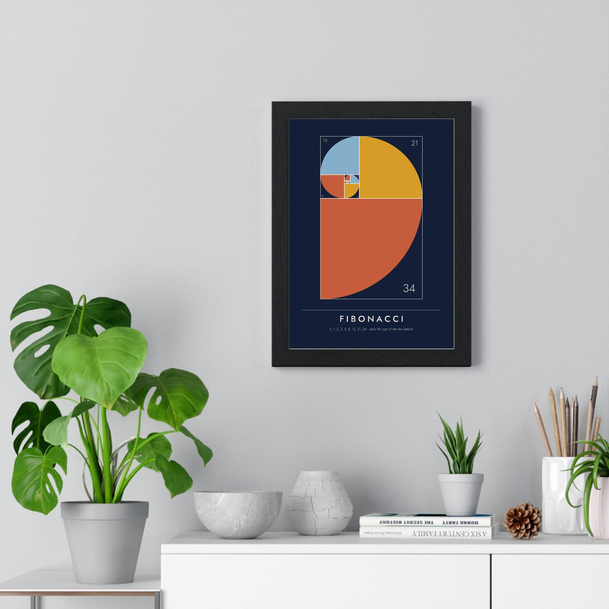 Fibonacci Sequence print framed on a living room wall