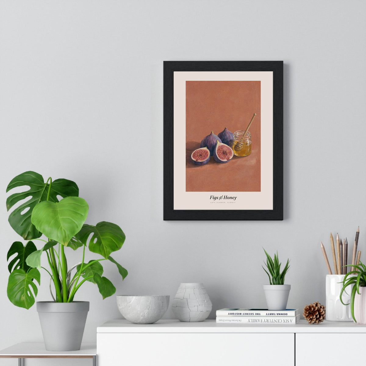Figs and Honey Print framed on a living room wall