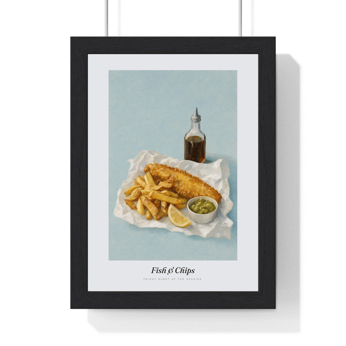 Fish and Chips Print framed in a black frame, ready to hang