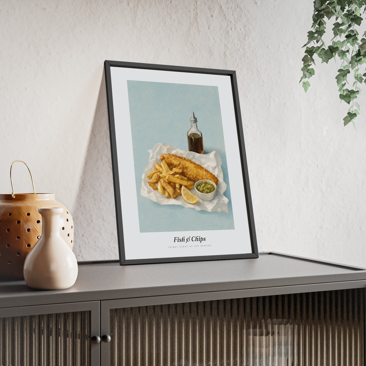 Fish and Chips Print framed and leaning on a sideboard