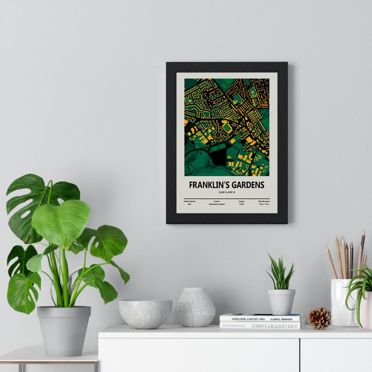 Franklin's Gardens stadium map print framed on a living room wall
