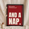 Funny All I Want for Christmas Is You lyric print in a black frame propped up on linen