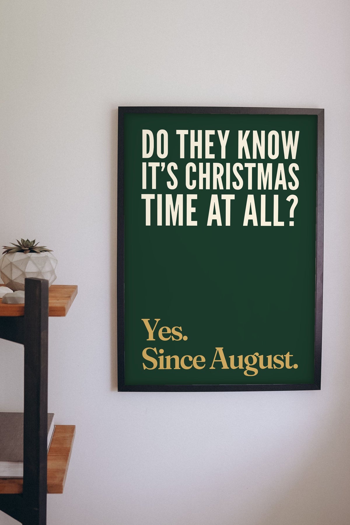 Funny Do They Know It's Christmas? lyric print framed on a wall