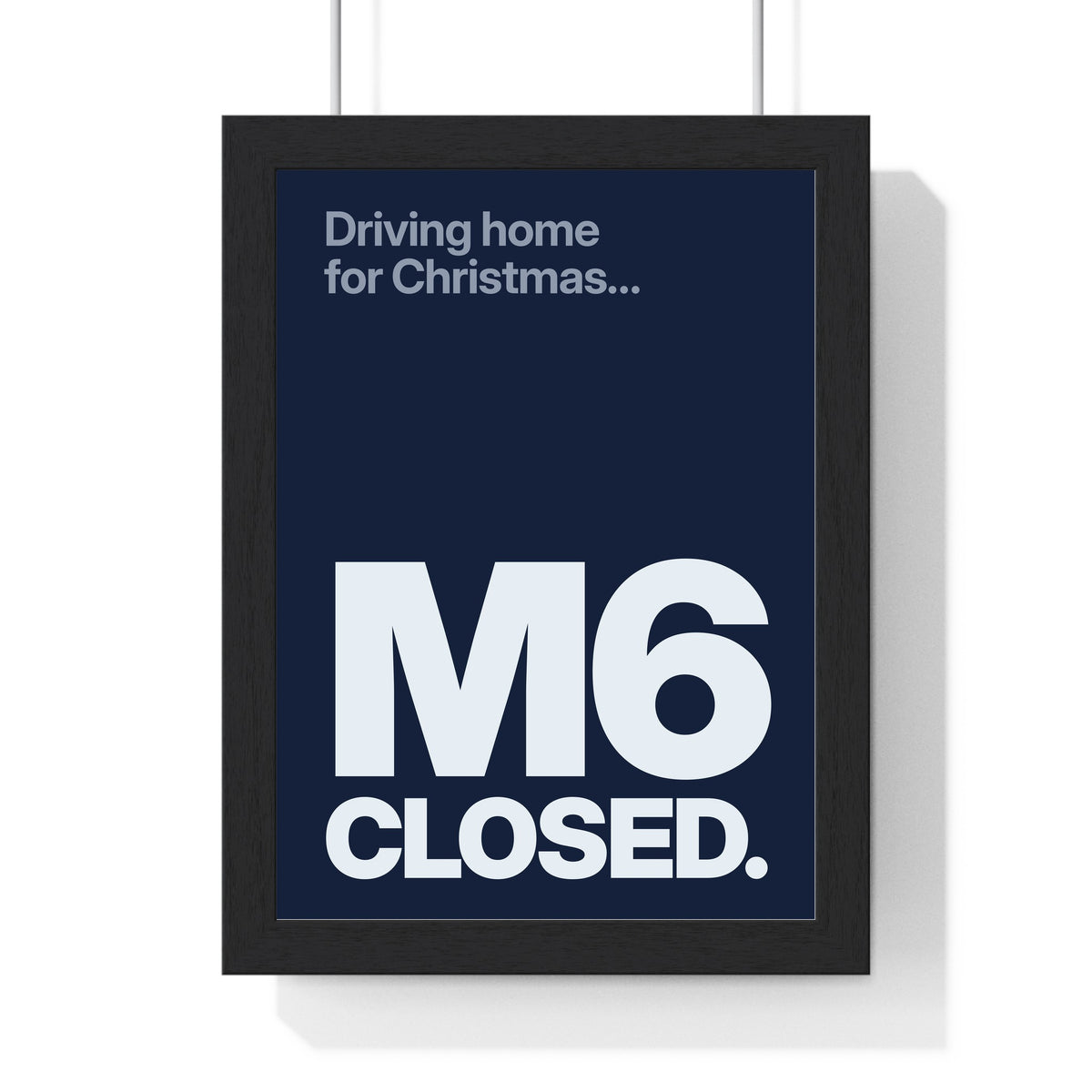 Funny Driving Home for Christmas lyric print in a black frame