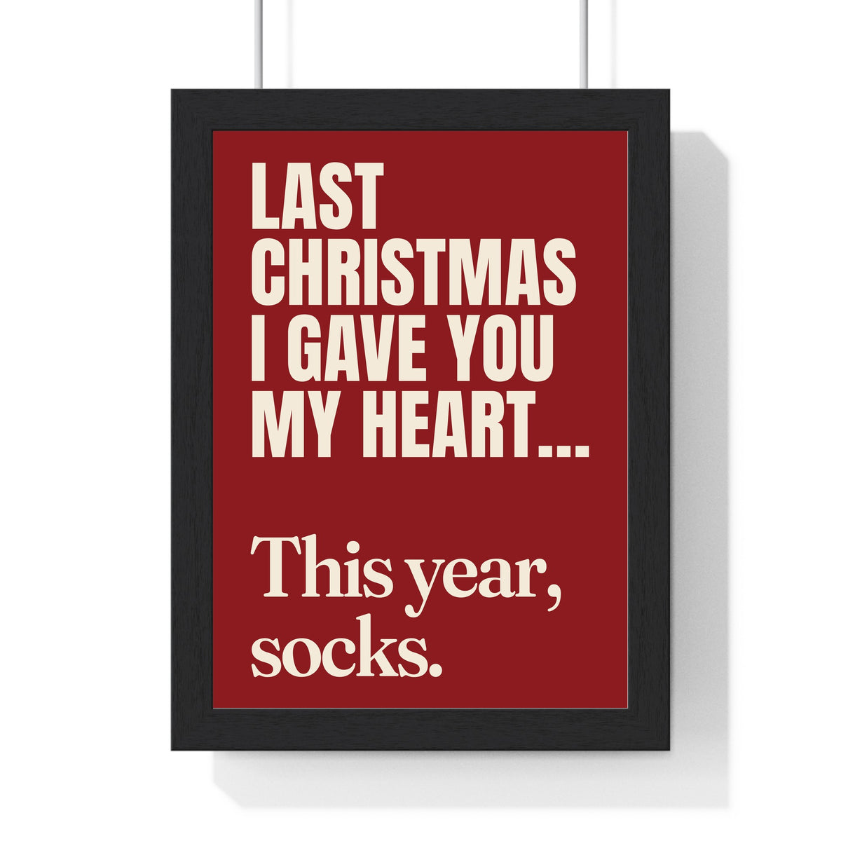 Funny Last Christmas lyric print in a black frame