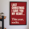 Funny Last Christmas lyric print framed on a wall