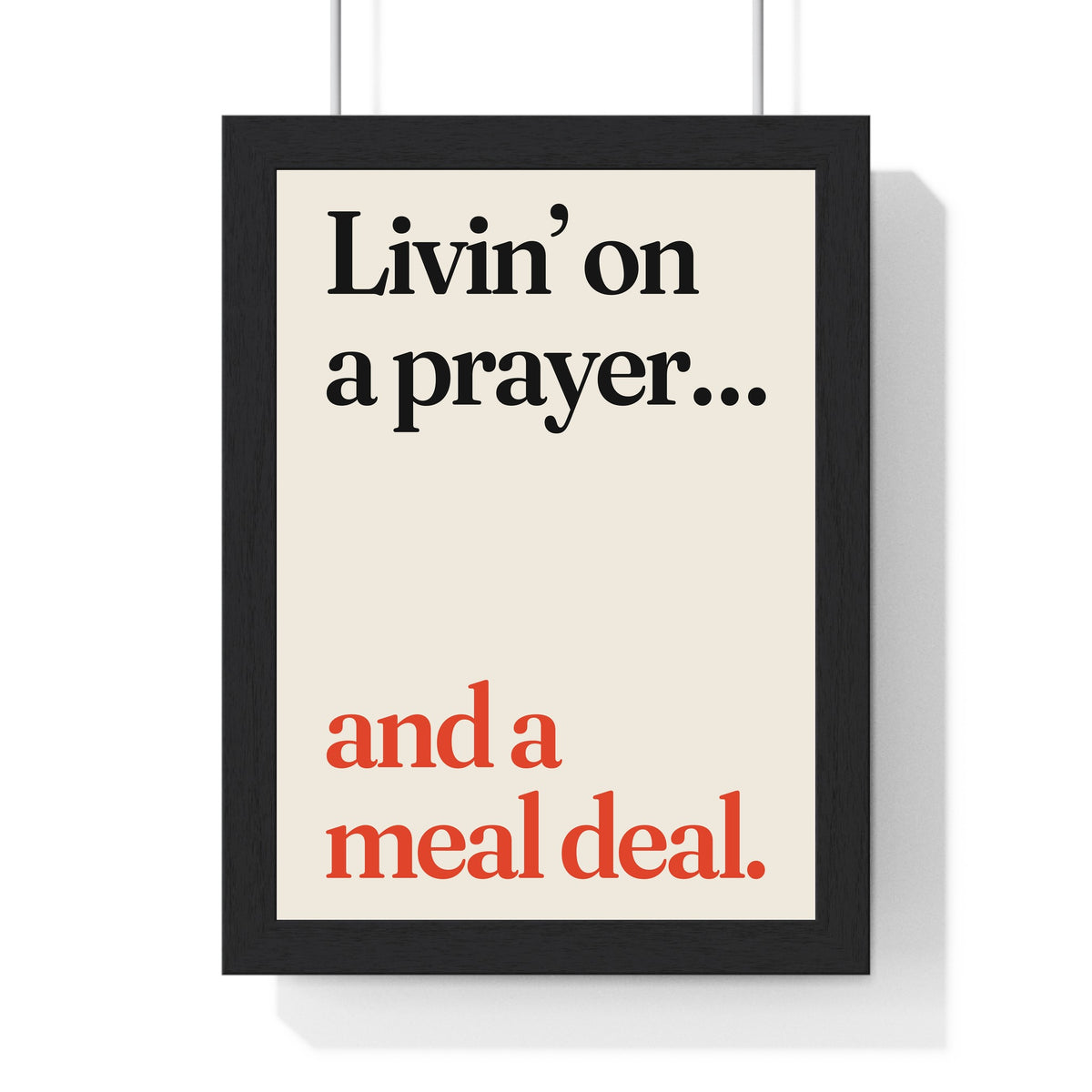 Funny Livin' on a Prayer lyric print in a black frame