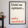Funny Livin' on a Prayer lyric print framed on a wall