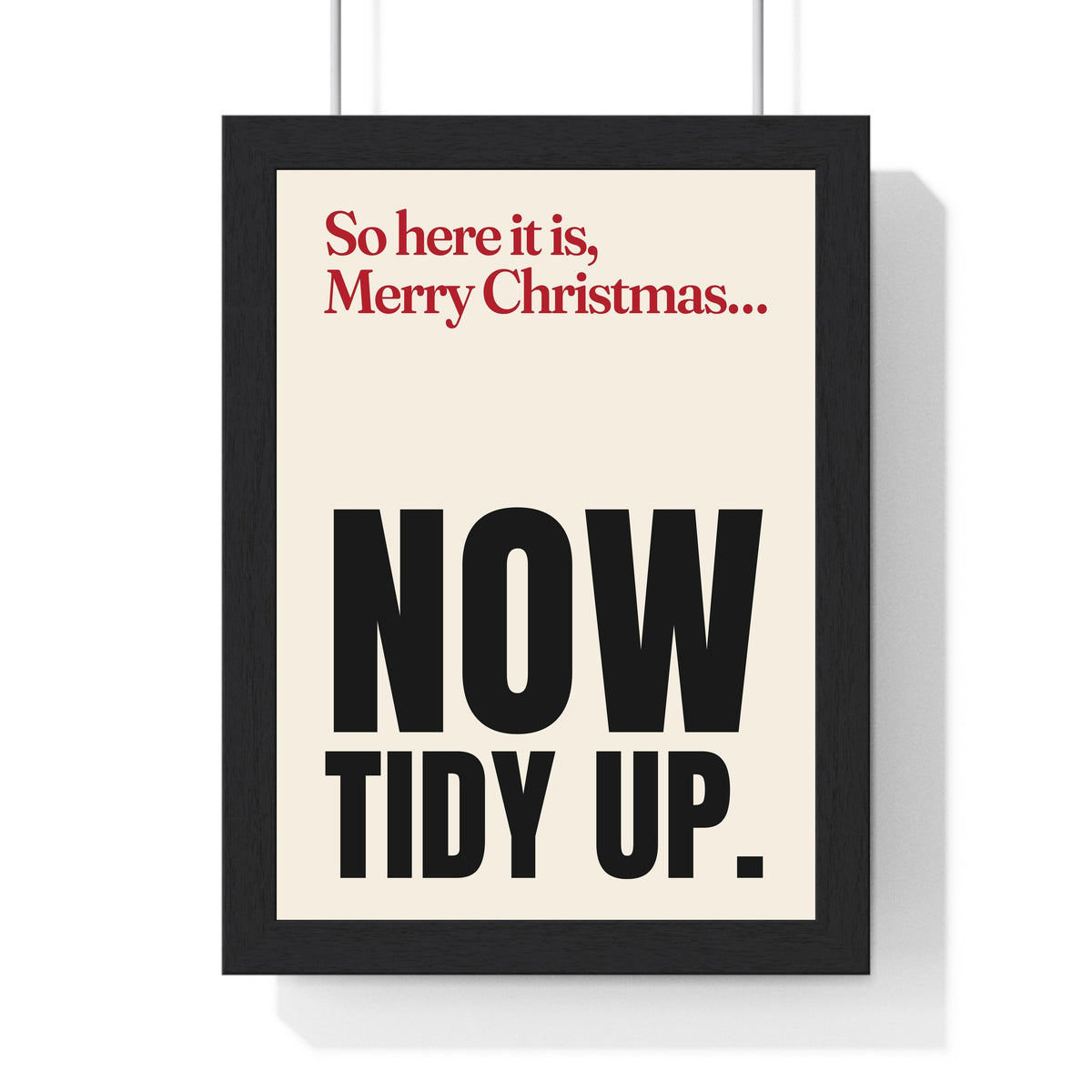 Funny Merry Xmas Everybody lyric print in a black frame