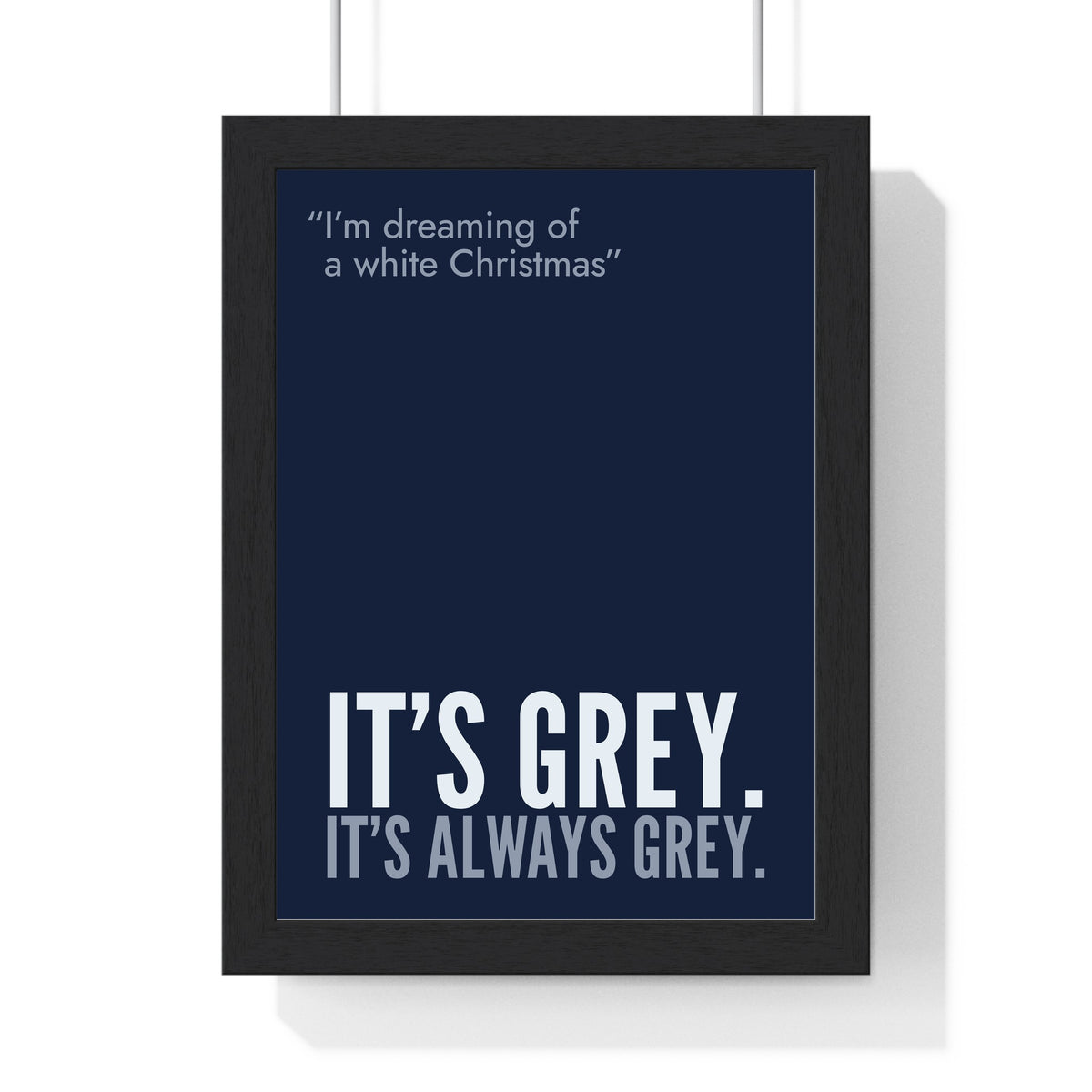 Funny White Christmas lyric print in a black frame