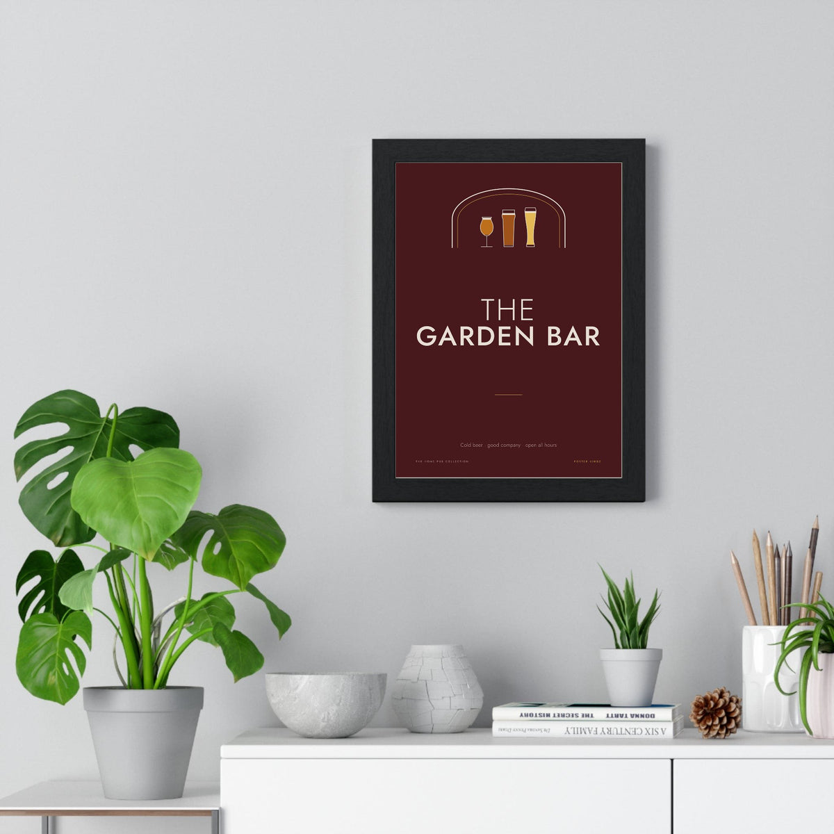 The Garden Bar Sign Print framed on a living room wall